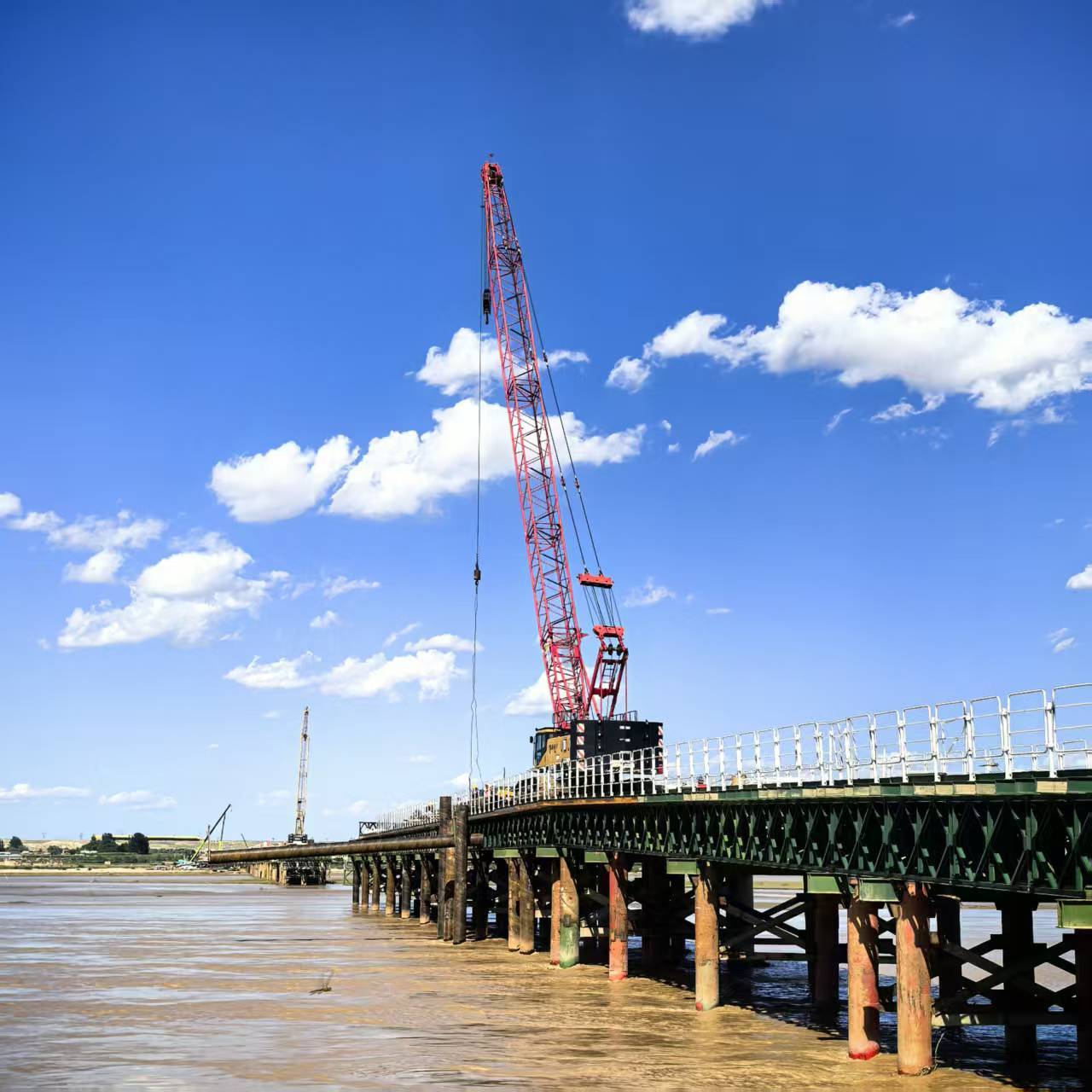 乌石高速巴音陶亥黄河特大桥施工栈桥合龙 乌石高速巴音陶亥黄河特大桥施工栈桥合龙