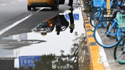 北京雨后积水未消天空阴沉 下午至夜间强降雨再来