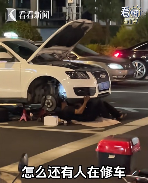 上海警方就“闹市路口有人躺地占道修车”回应：王某、邹某某已被依法处罚！详情披露