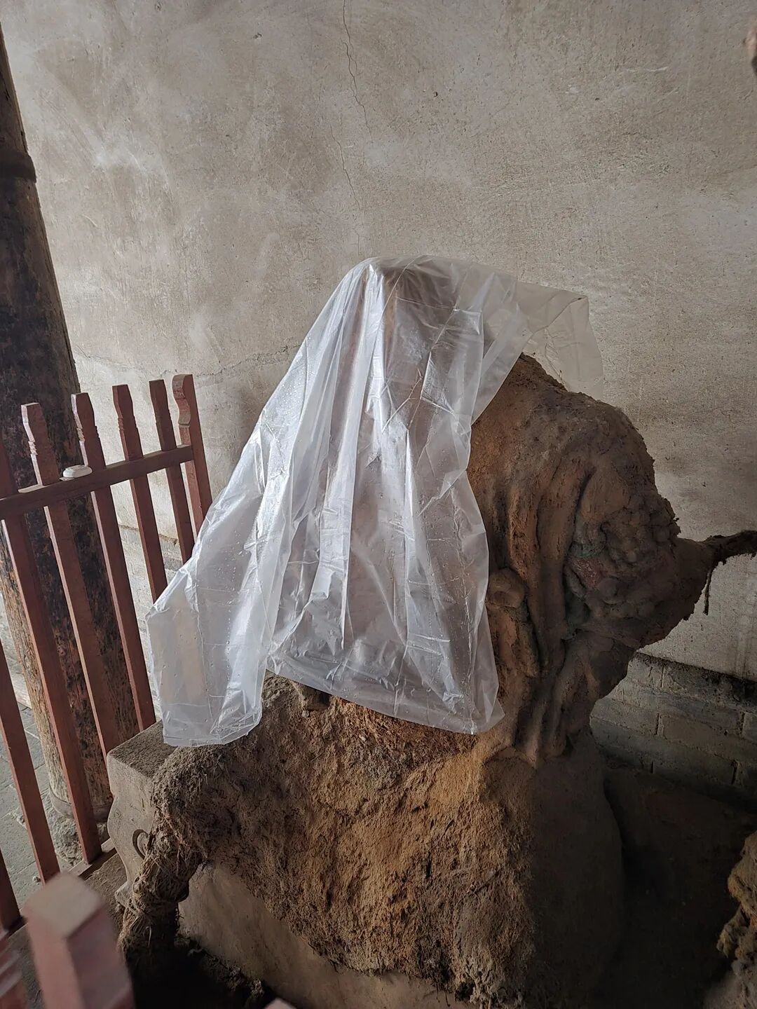 山西网红神像“小土豆”半张脸没了？ 当地文保中心回应