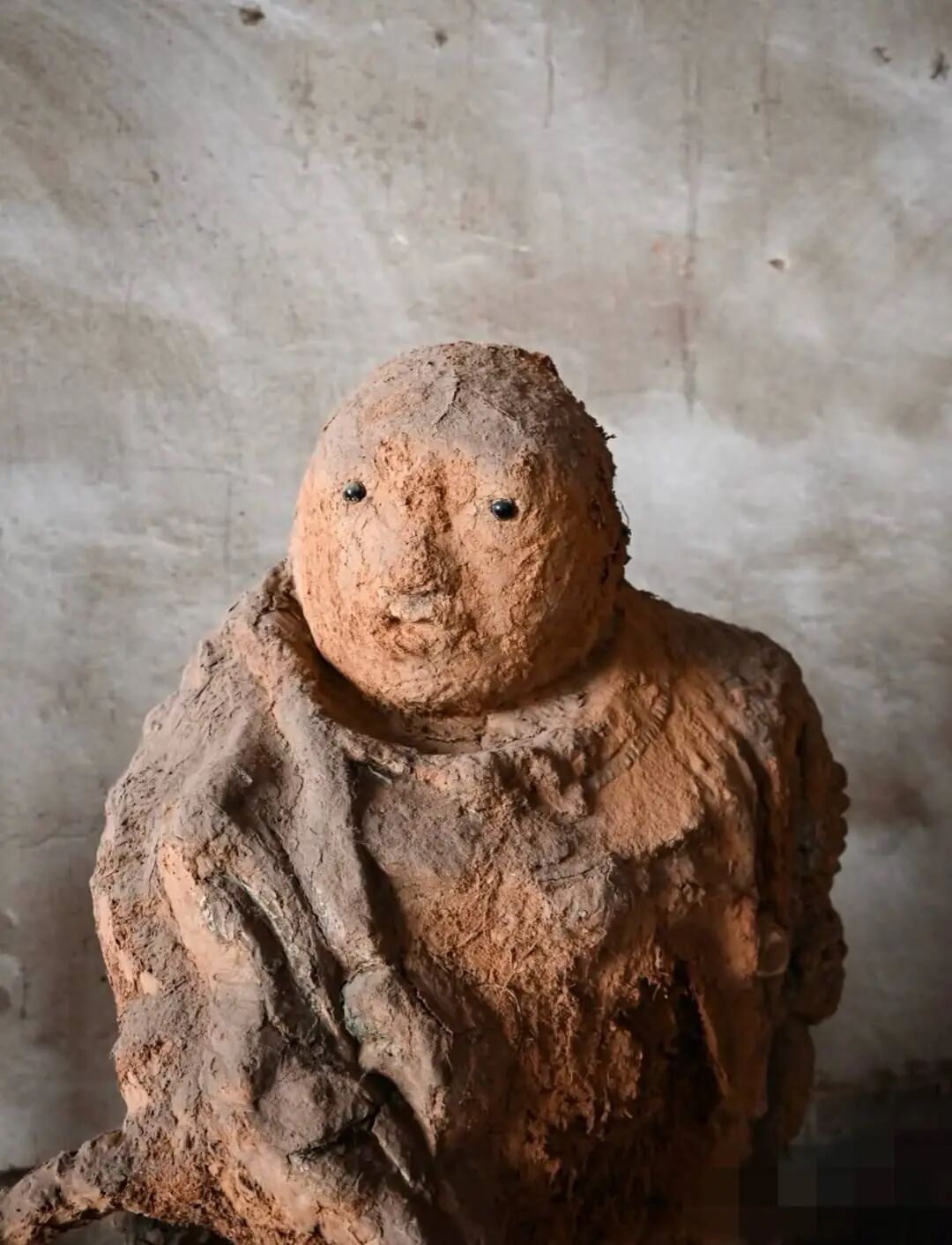 山西网红神像“小土豆”半张脸没了？ 当地文保中心回应