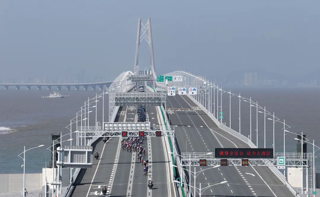 全运会首次！跨境自行车赛，如何6次不停车通关？