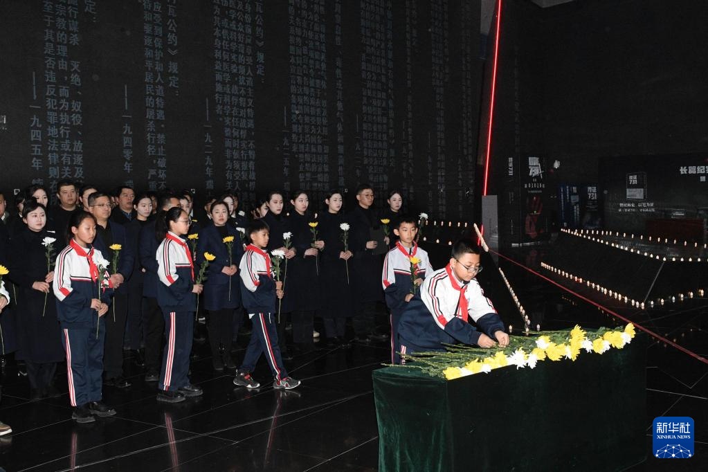 各地举行国家公祭日悼念活动