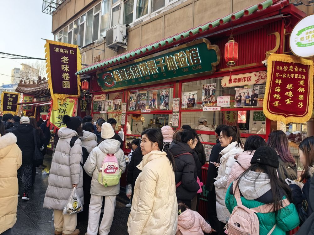 记者手记:一间小店里的新年心愿 记者手记:一间小店里的新年心愿