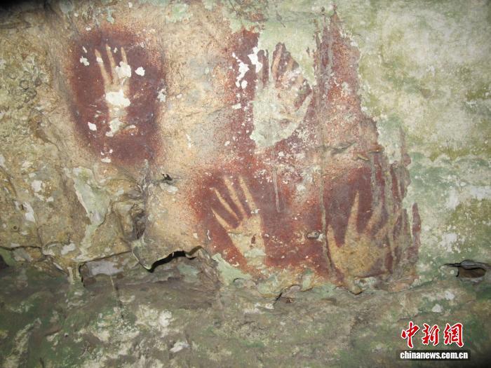 印尼发现6.78万年前洞穴手印 将世界最古老岩画前推约1100年