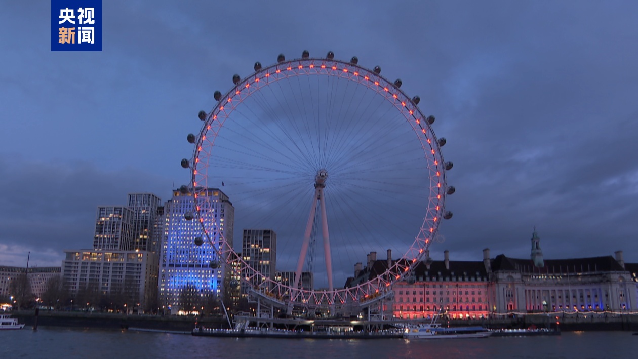 点亮中国红!英国地标伦敦眼披上中国春节装扮 点亮中国红!英国地标伦敦眼披上中国春节装扮