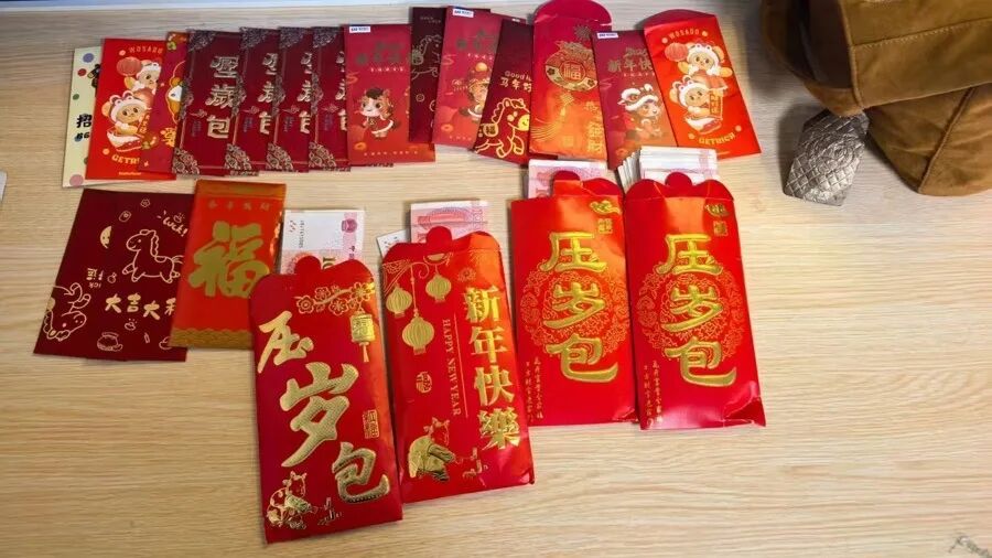 结棍！上海爷叔除夕夜捡到7万多红包，4个娃的压岁钱物归原主...