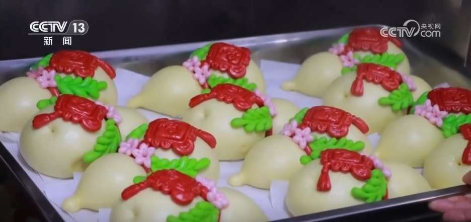 指尖技艺“蒸”出红火年味 特色美食撬动乡村振兴大产业