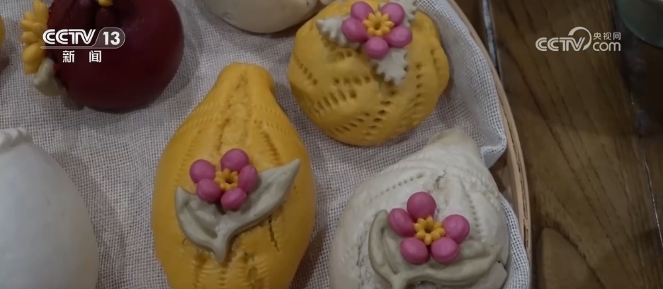 指尖技艺“蒸”出红火年味 特色美食撬动乡村振兴大产业
