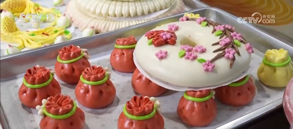 指尖技艺“蒸”出红火年味 特色美食撬动乡村振兴大产业