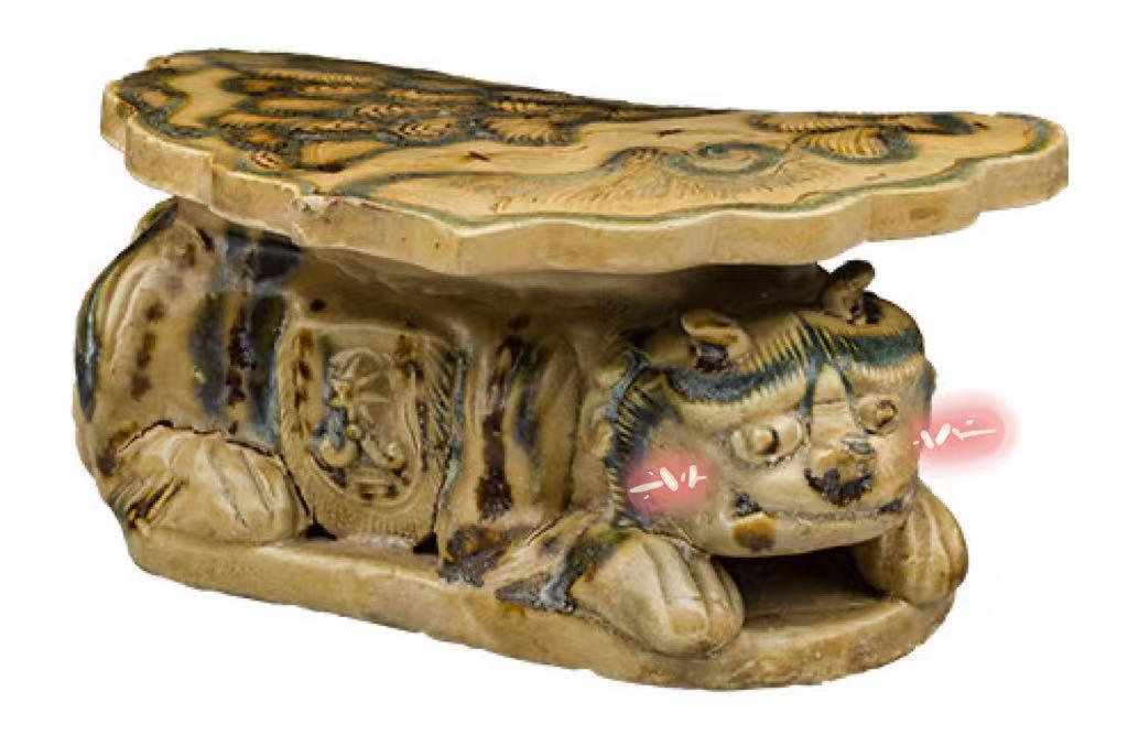 古人的“硬”核瓷枕 由一只小兽来守护