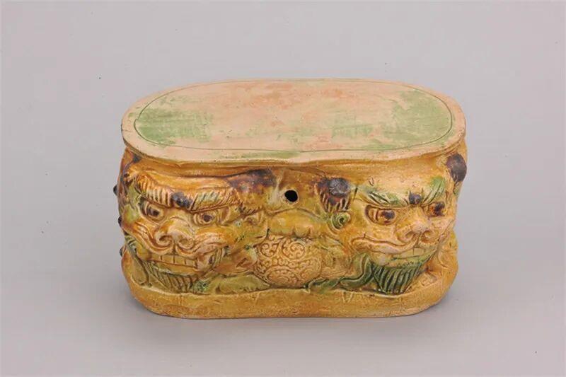 古人的“硬”核瓷枕 由一只小兽来守护