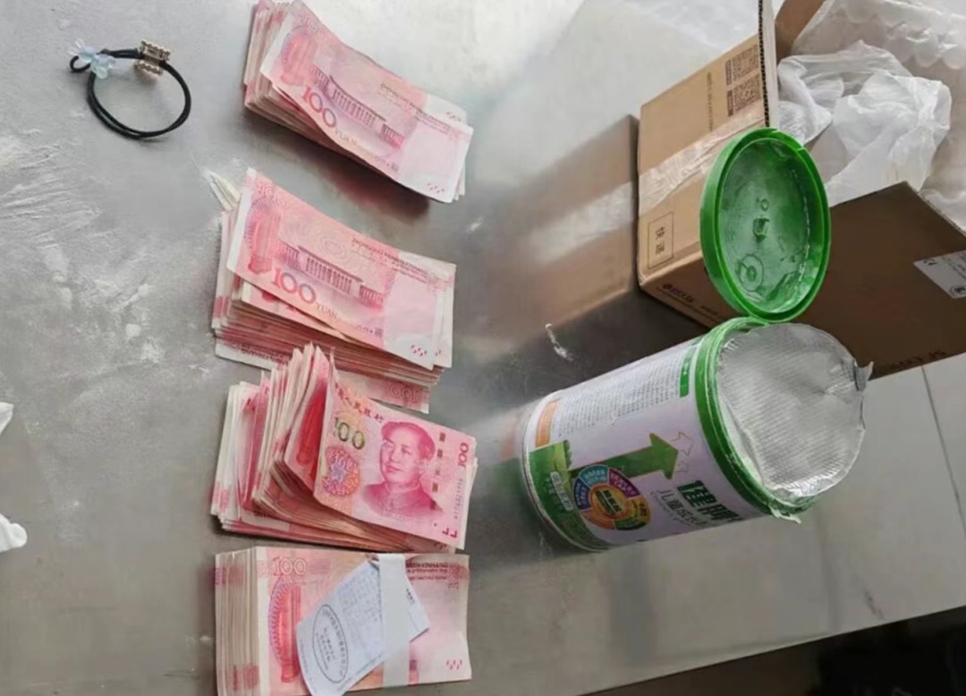 女子用奶粉罐藏现金寄出，淮阳警方紧急拦截！