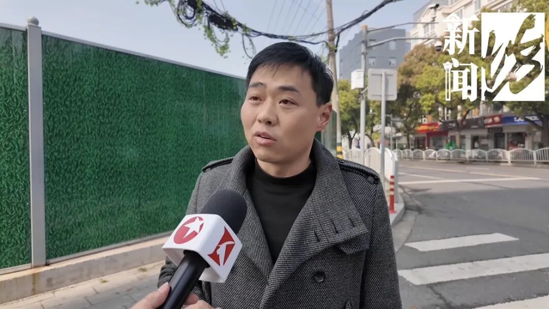 上海这条马路半空挂着啥？经过的人都得看两眼！原因绝对想不到…