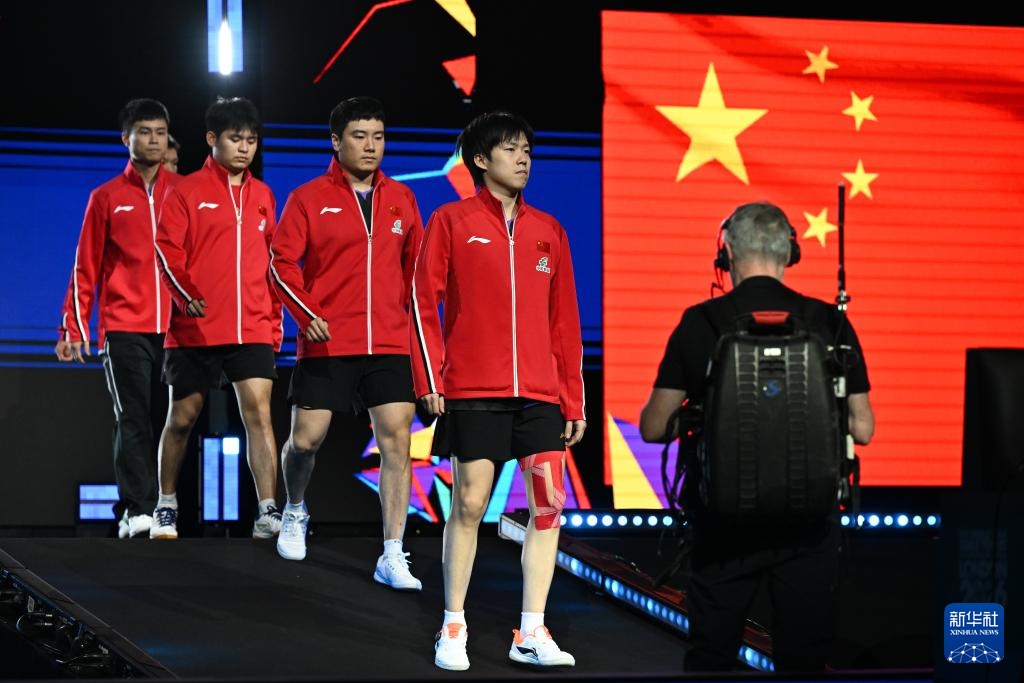 世乒赛：中国男队晋级16强