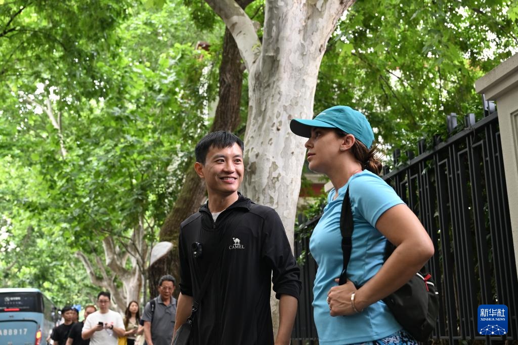 图片故事丨入境旅游策划师刘礼超：用骑行游向世界讲述“上海故事”