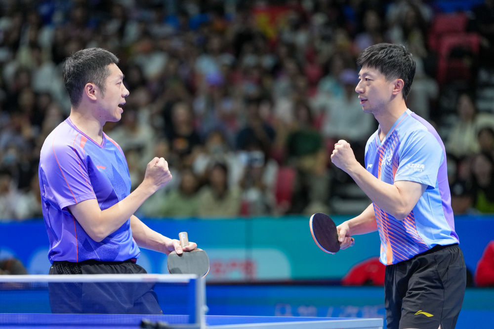 马龙/许昕三夺乒乓球全锦赛男双冠军 马龙/许昕三夺乒乓球全锦赛男双冠军