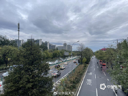 北京雨后冷意加深路面湿滑 北京雨后冷意加深路面湿滑