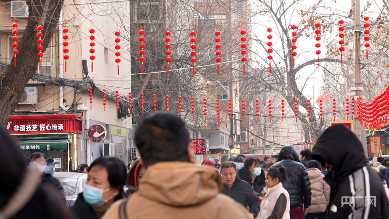 巧开“千把锁” “小巷总理”托起